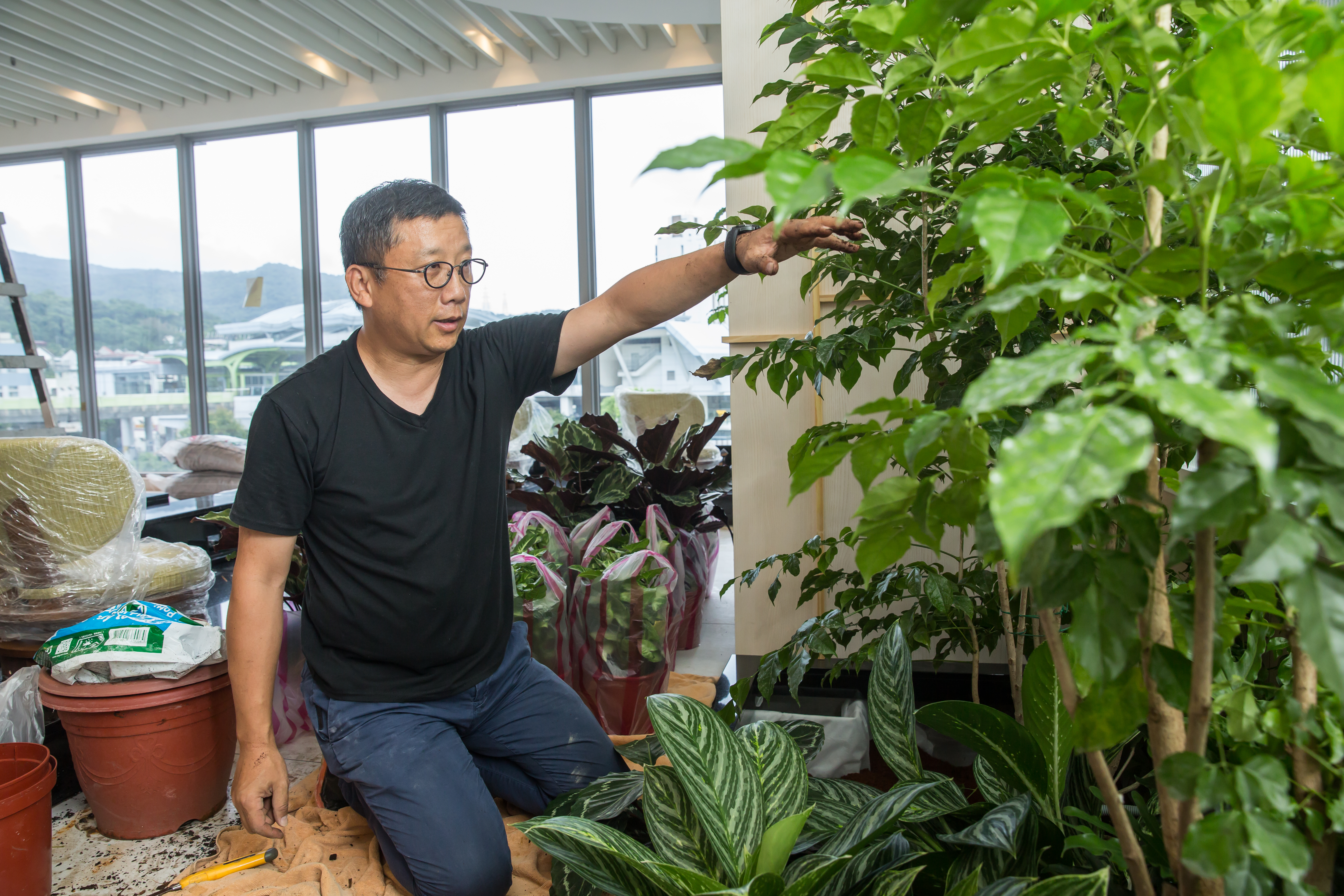 江慶鐘喜歡園藝，大直會館的植栽都是他挑選親種。