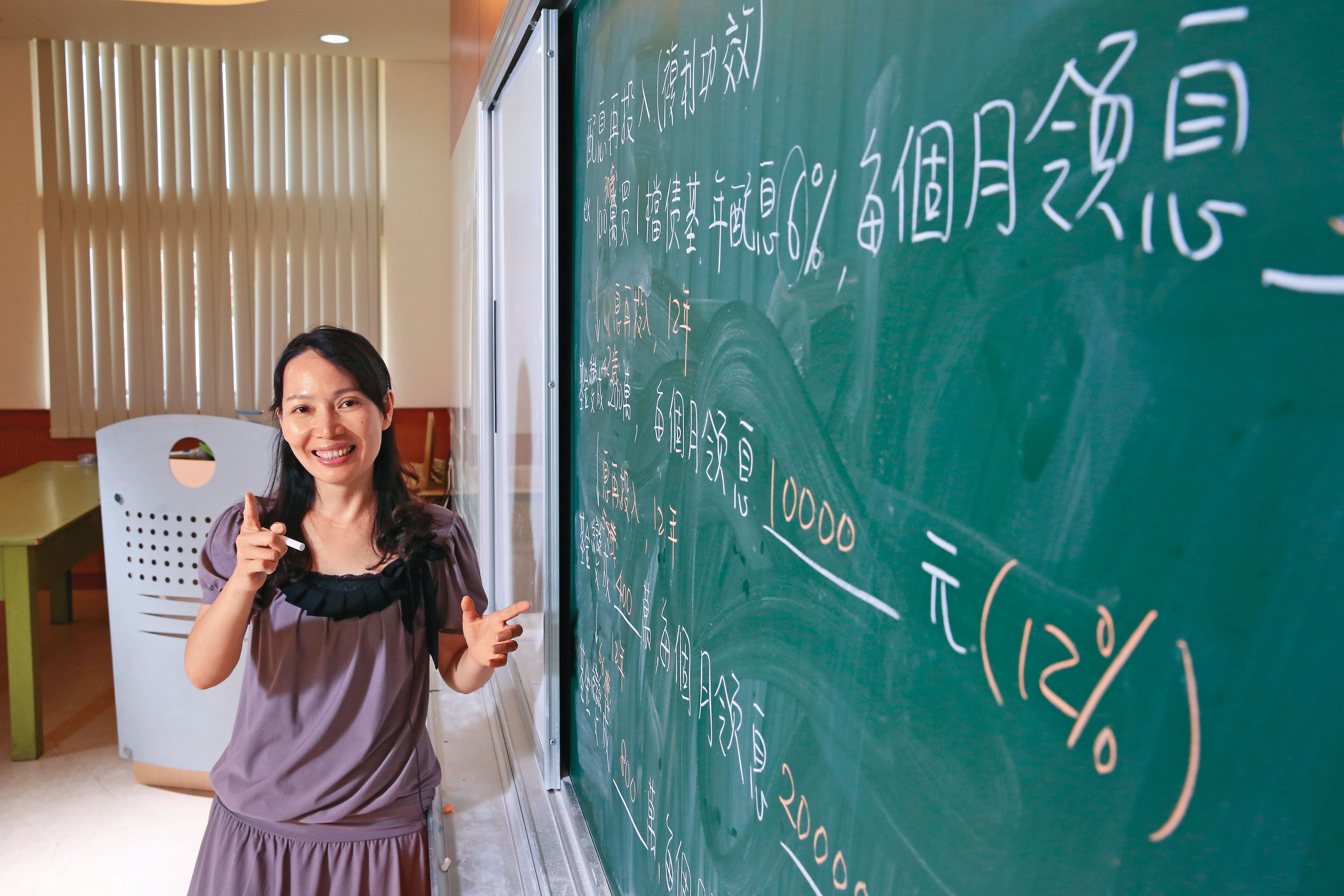 數學老師黃惠玲將百萬元基金配息，持續滾入投資市場。