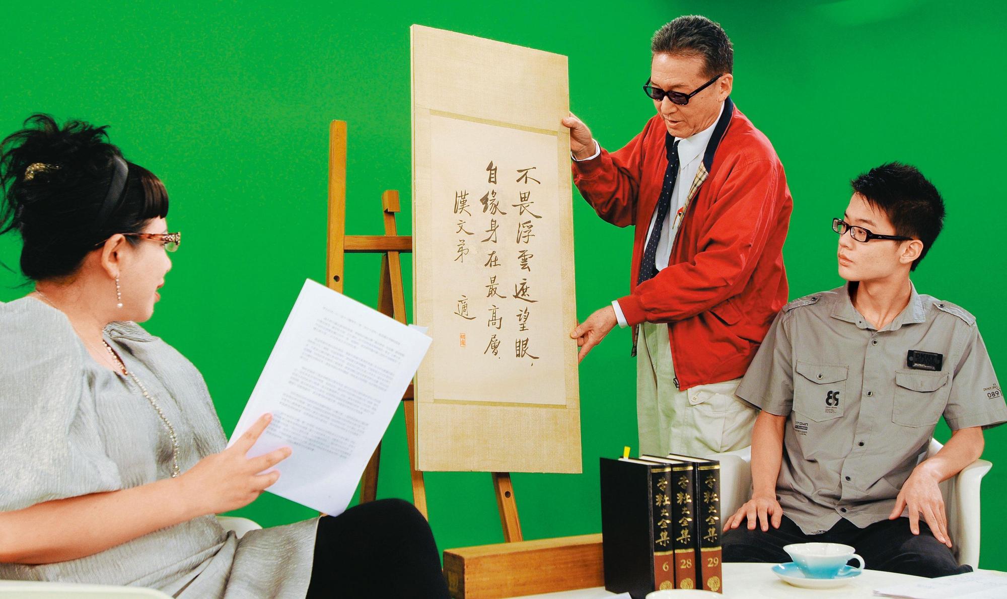 李敖（左）與李戡（右）父子2010年一同接受電視節目訪談。（聯合知識庫）