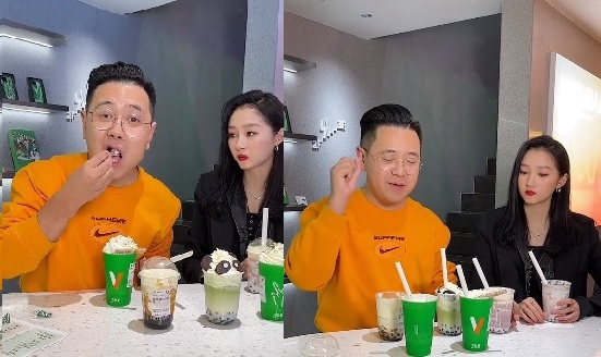 關曉彤與網紅拍影片宣傳自家奶茶店，全程冷臉。（翻攝自城牆下的野男人微博視頻）