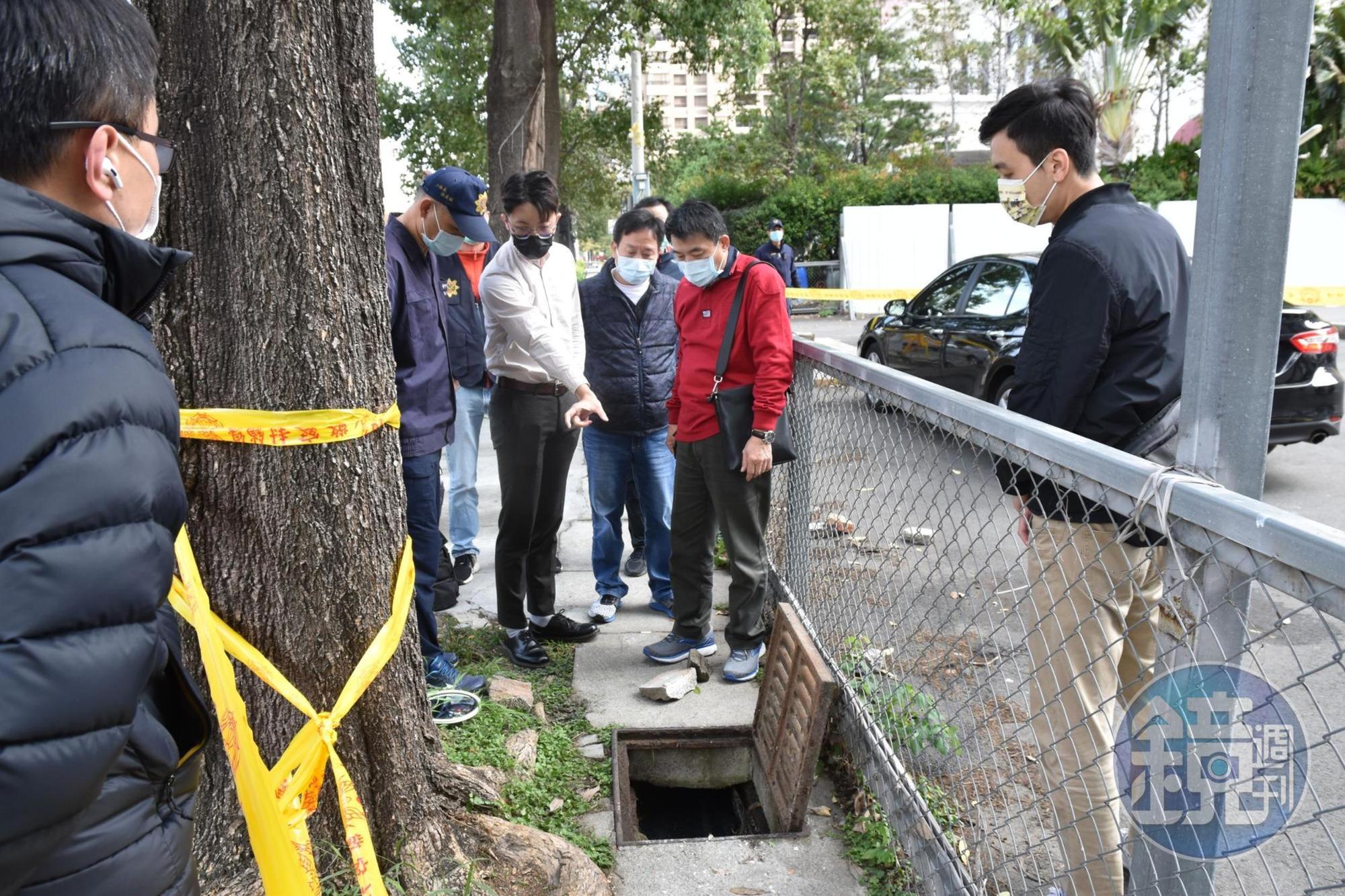 台中市七期重劃區路邊窄小的水溝裡發現男屍,懷疑是吸膠後產生幻覺,自己鑽進陰溝裡。(讀者提供)