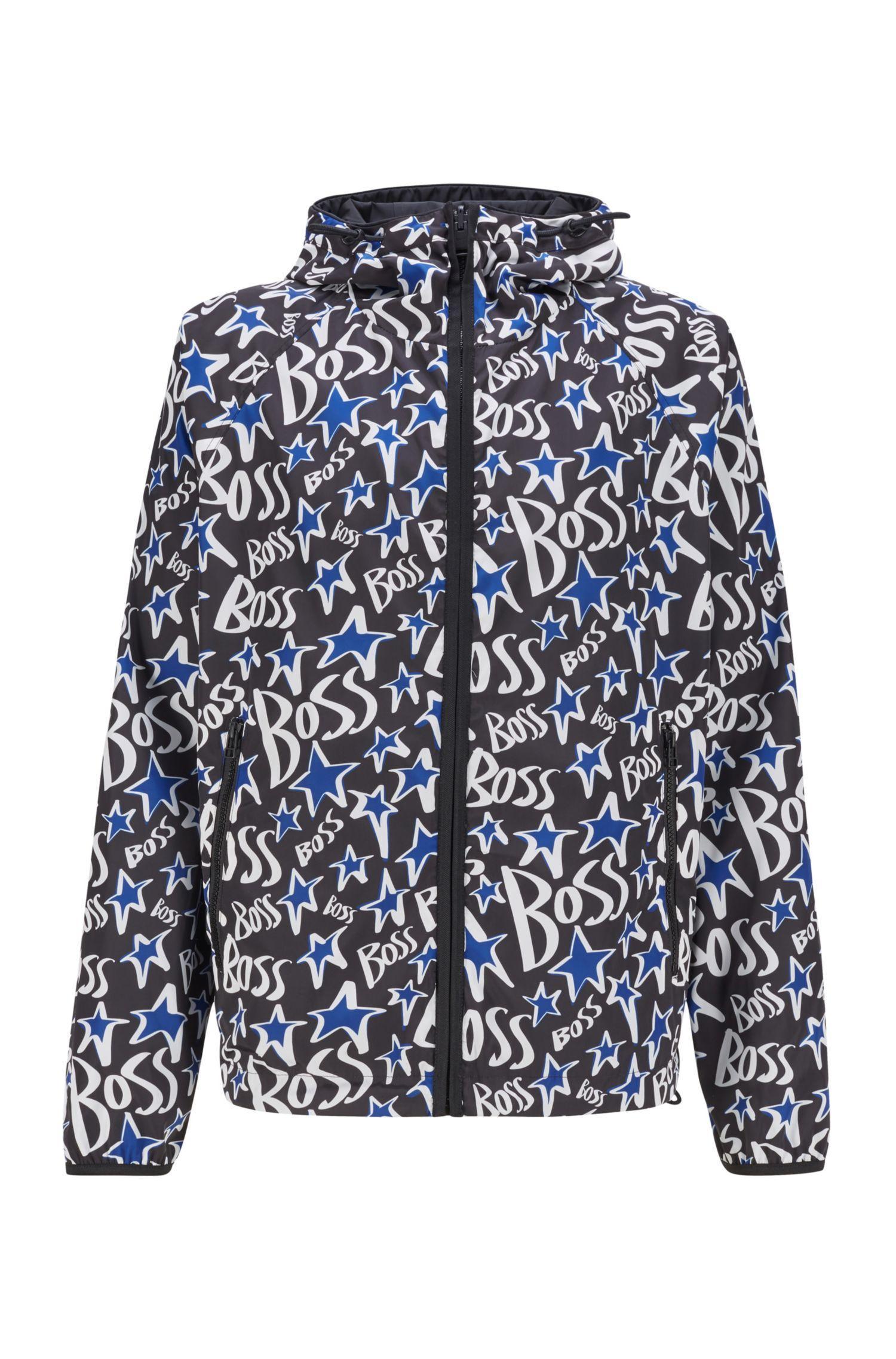 BOSS x Justin Teodoro假日聯名系列黑色塗鴉雙面防水外套。NT$17,400（BOSS提供）