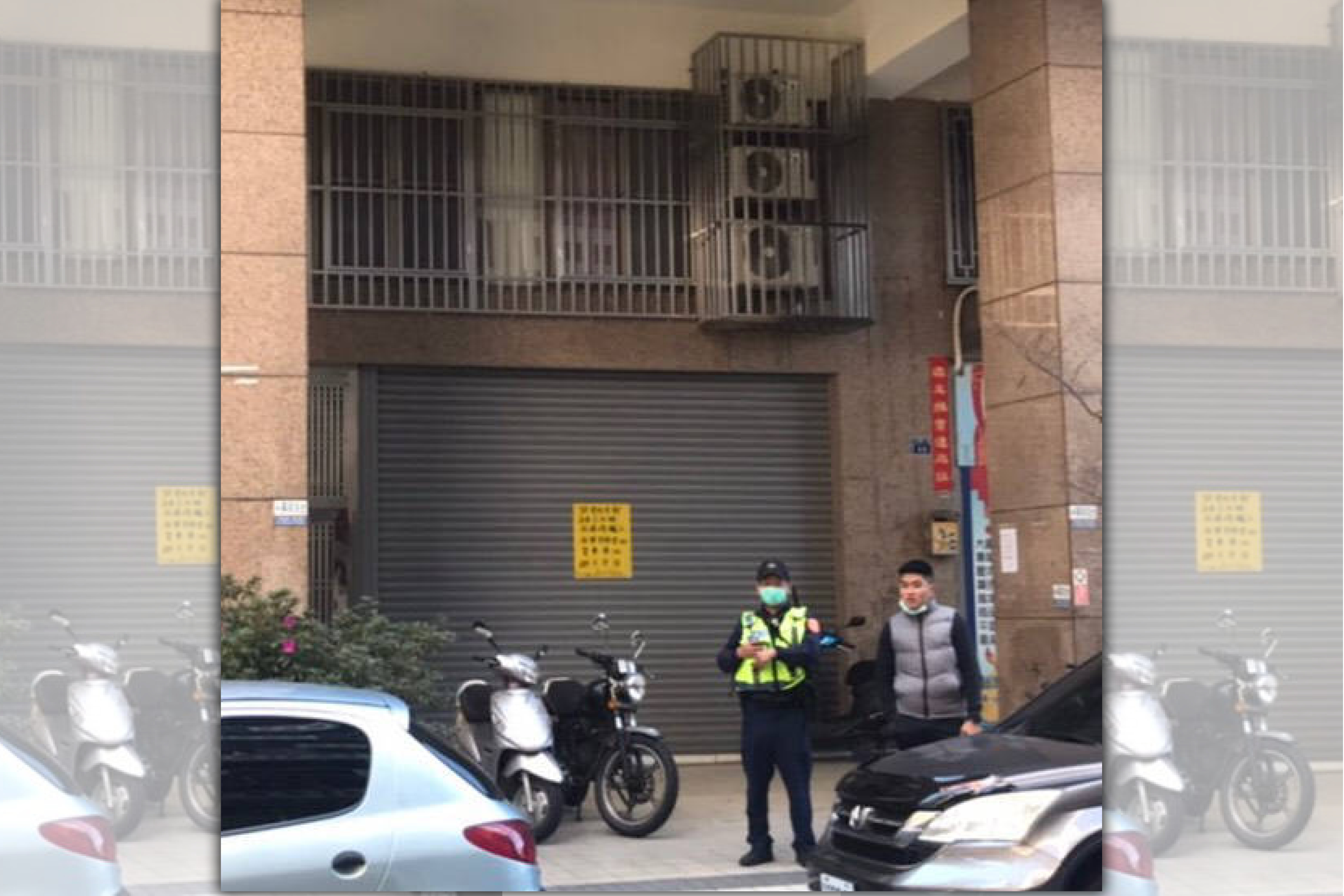 胡男今天上午回西屯區租住處，破門驚見妻子已死亡，警方封鎖現場採證。（讀者提供）