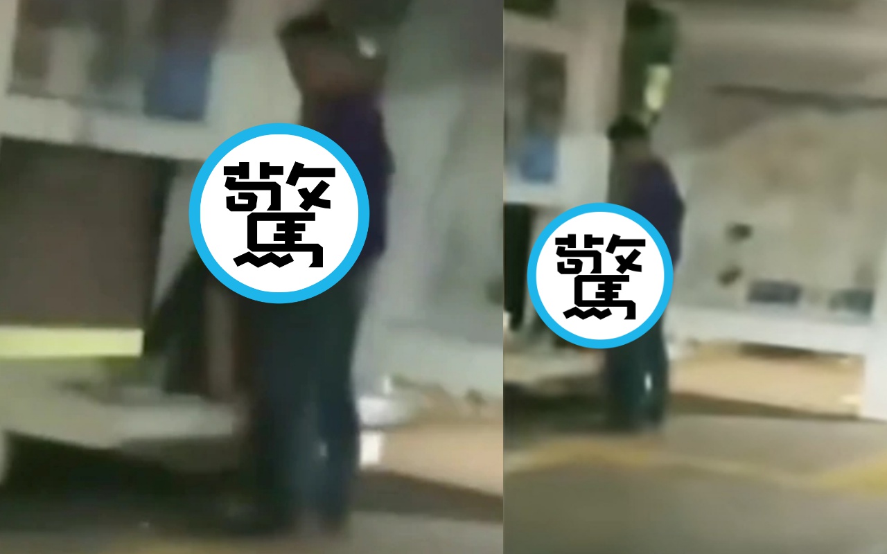 印尼雅加達有對男女，在光天化日之下上演「激情吞吐」戲碼。（翻攝自YouTube Warta Kota Production）