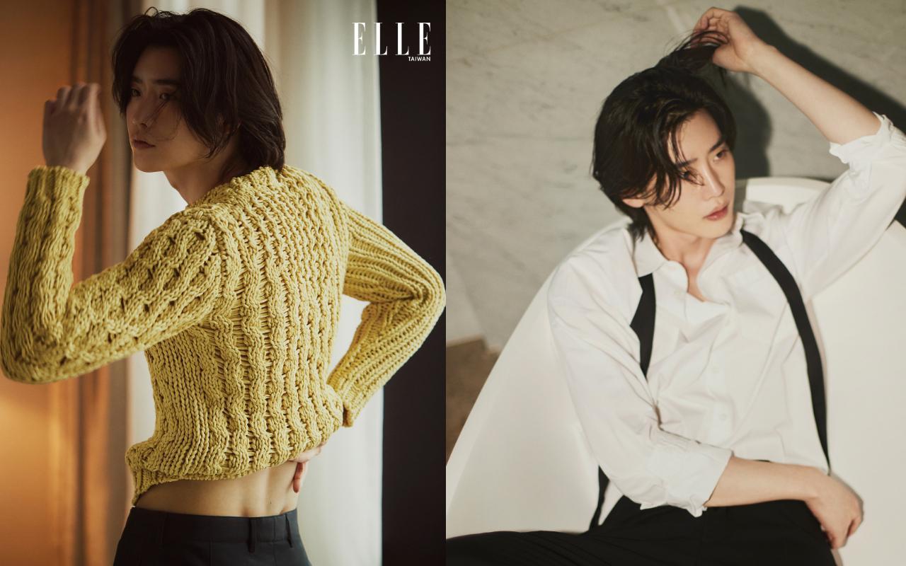 李鍾碩退伍回歸,登上《ELLE》3月號封面,展示有「維納斯酒窩」之稱的腰窩與成熟男人味。(《ELLE》國際中文版雜誌提供)