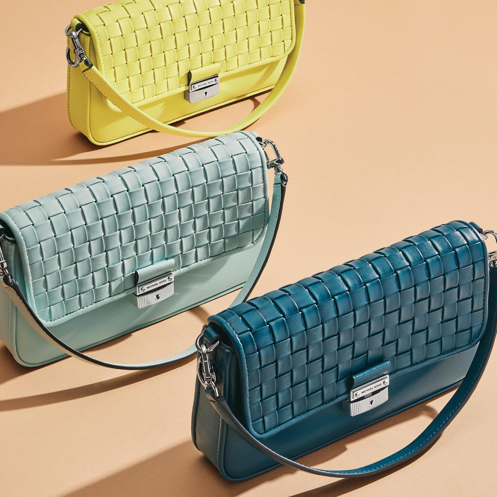 皮革編織Bradshaw系列。各NT$20,200。（MICHAEL KORS）