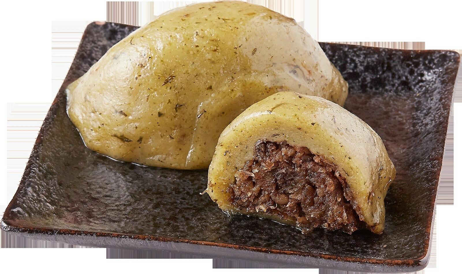 外皮散發春天清香的草仔粿,內餡是用新鮮蘿蔔、蝦仁、蝦米、紅葱頭及絞肉。(石龜溪粿舖提供)