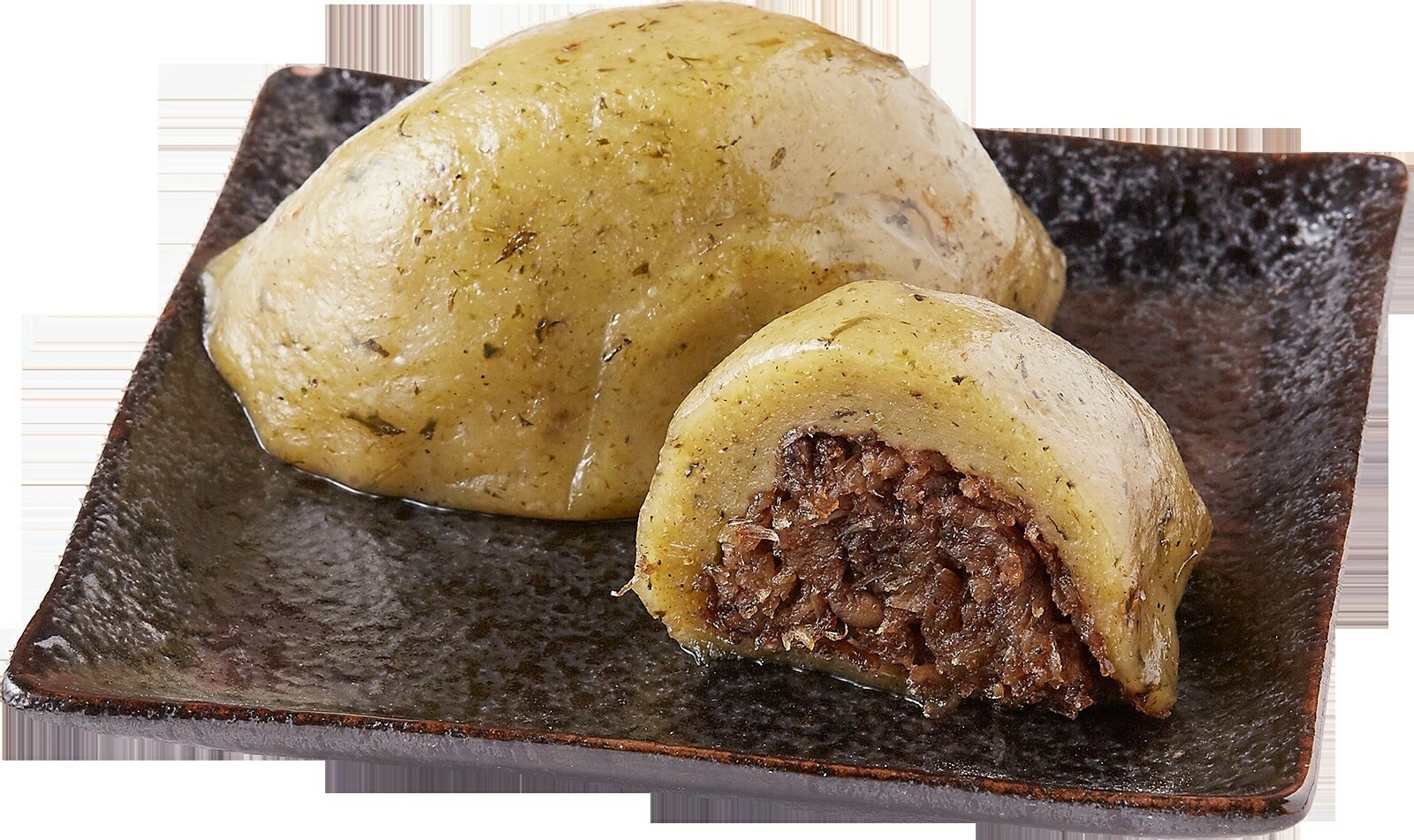 外皮散發春天清香的草仔粿，內餡是用新鮮蘿蔔、蝦仁、蝦米、紅葱頭及絞肉。（石龜溪粿舖提供）