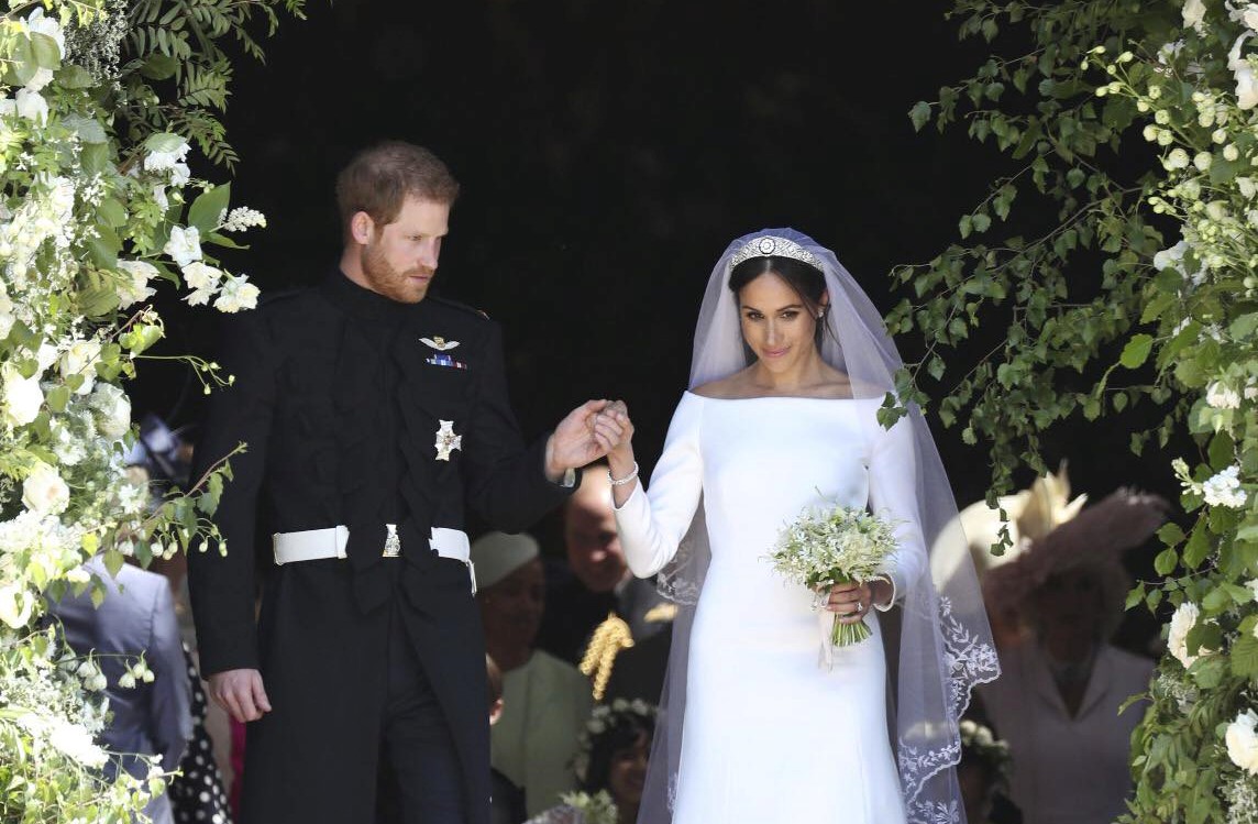 哈利王子（左）於2018年5月19日與梅根舉行世紀婚禮。（翻攝The Royal Family臉書）