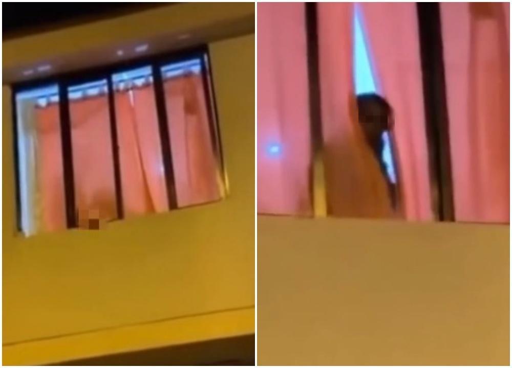 女方「忘情吞吐」到一半發現樓下有動靜,拉開窗簾察看後趕緊關燈。(翻攝自漩渦視頻微博)