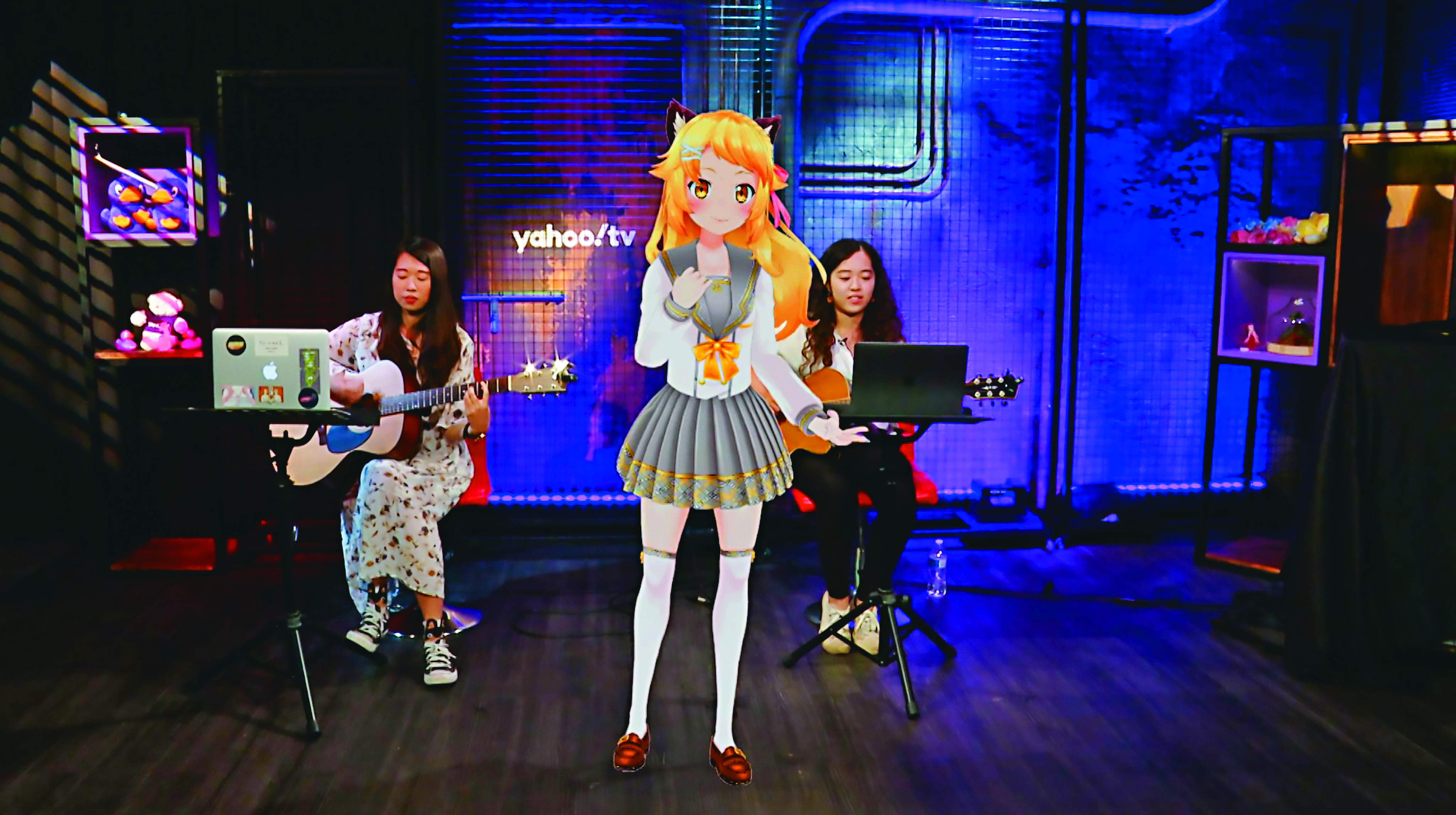 利用AR技術，Yahoo TV虛擬網紅「虎妮」能與真人樂團同台演出。（Yahoo TV提供）
