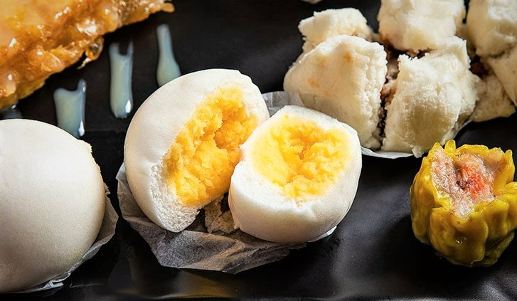 「九月茶餐廳」推出多款港式小吃冷凍包，一蒸即食超方便。（九月茶餐廳提供）