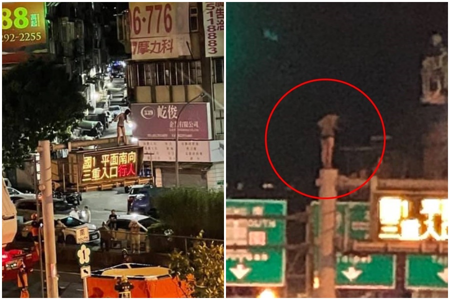 一名穿黑色激短熱褲妹，爬上車流較多的三重交流道口號誌燈柱上，引發大塞車。（翻攝自臉書爆料公社）