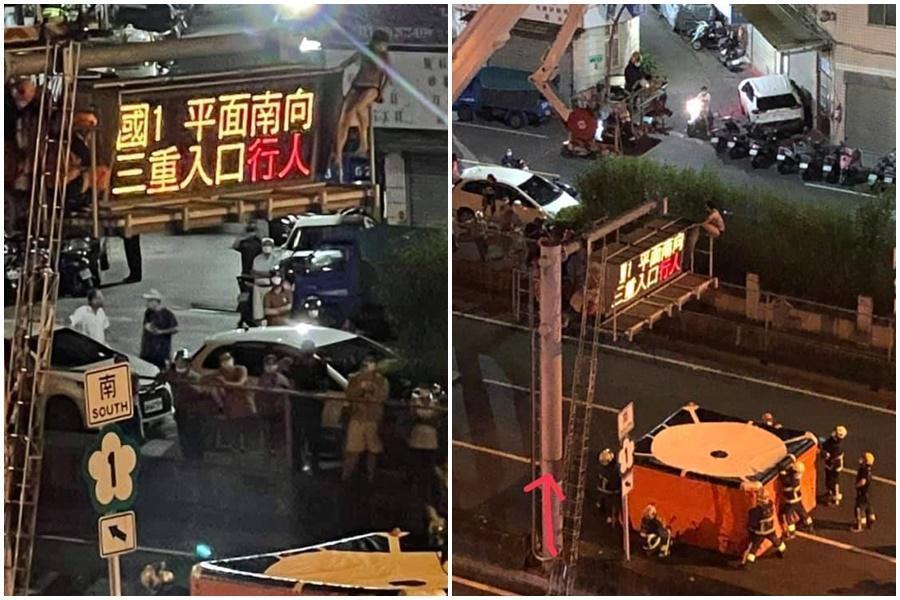 一名穿黑色激短熱褲妹，綁著馬尾、穿著杏色上衣，爬上號誌燈柱引發關注。（翻攝自臉書爆料公社）