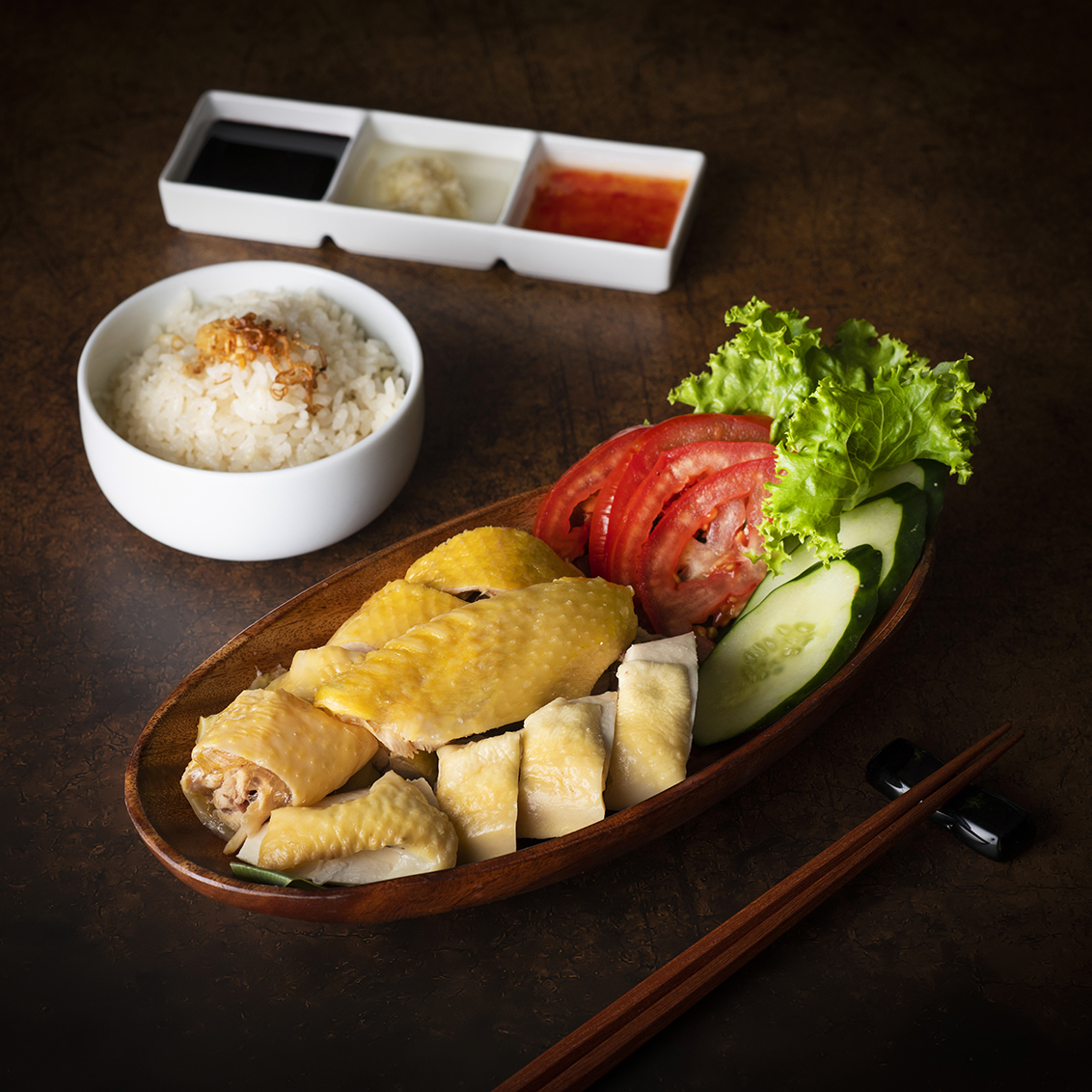 肉嫩多汁的「海南雞飯」，是「遠東Café」的人氣美食。（台北遠東香格里拉提供）