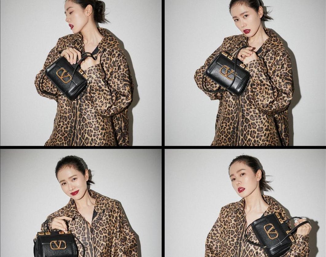 孫藝珍在IG上Po出身穿Valentino早秋ROMAN PALAZZO系列豹紋外套，搭配Rockstud Alcove手提包，加上紅唇完全展現了歐膩的霸氣感覺。（翻攝自孫藝珍IG）