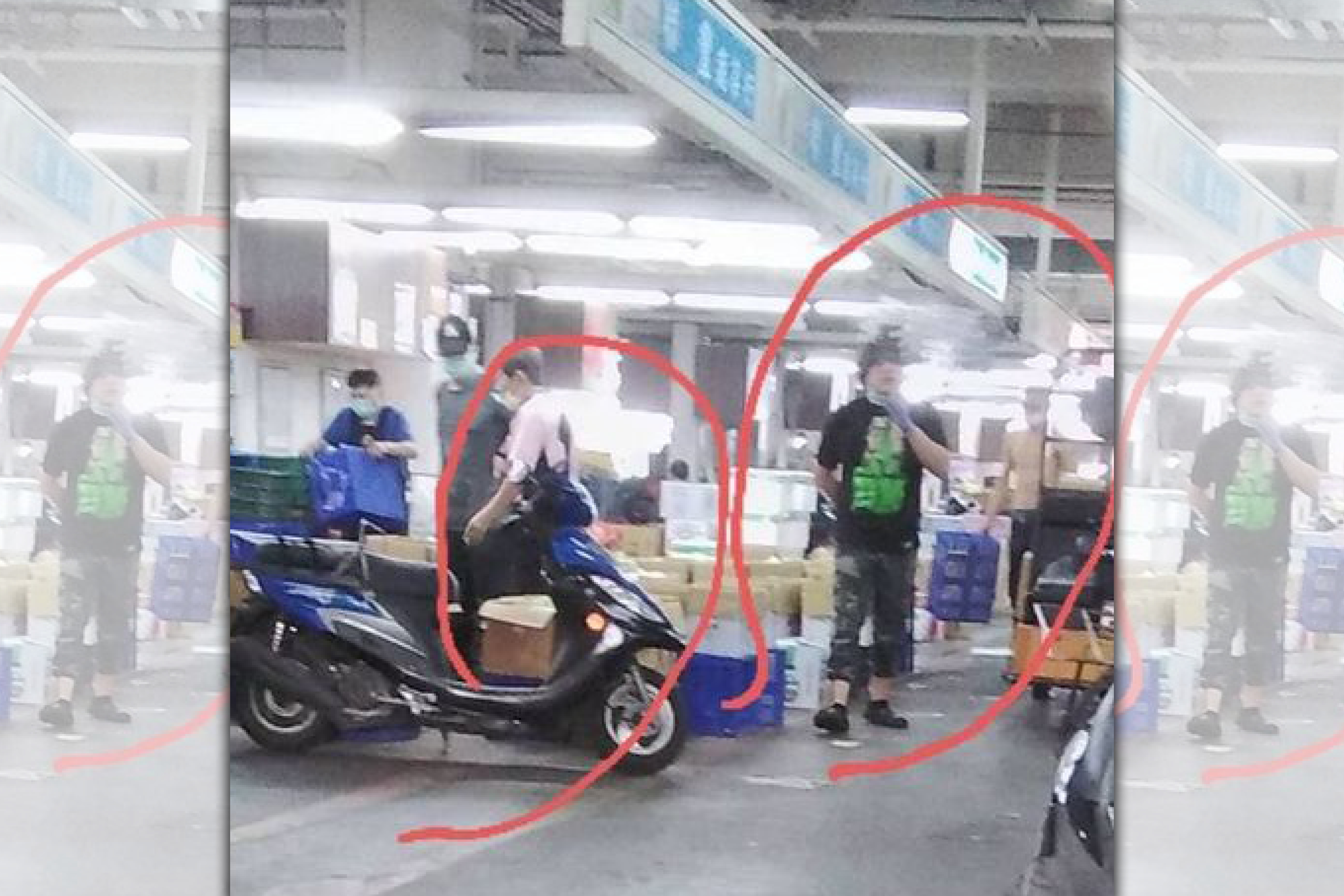 新北市議員黃俊哲踢爆，新北市果菜批發市長有多名攤商脫口罩抽菸、聊天。（黃俊哲服務處提供）