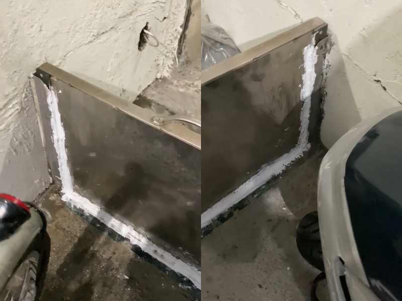 一名網友準備出門時，發現車道上的防水閘門竟被矽利康封死，讓她超傻眼。（翻攝自「爆怨2公社」臉書）