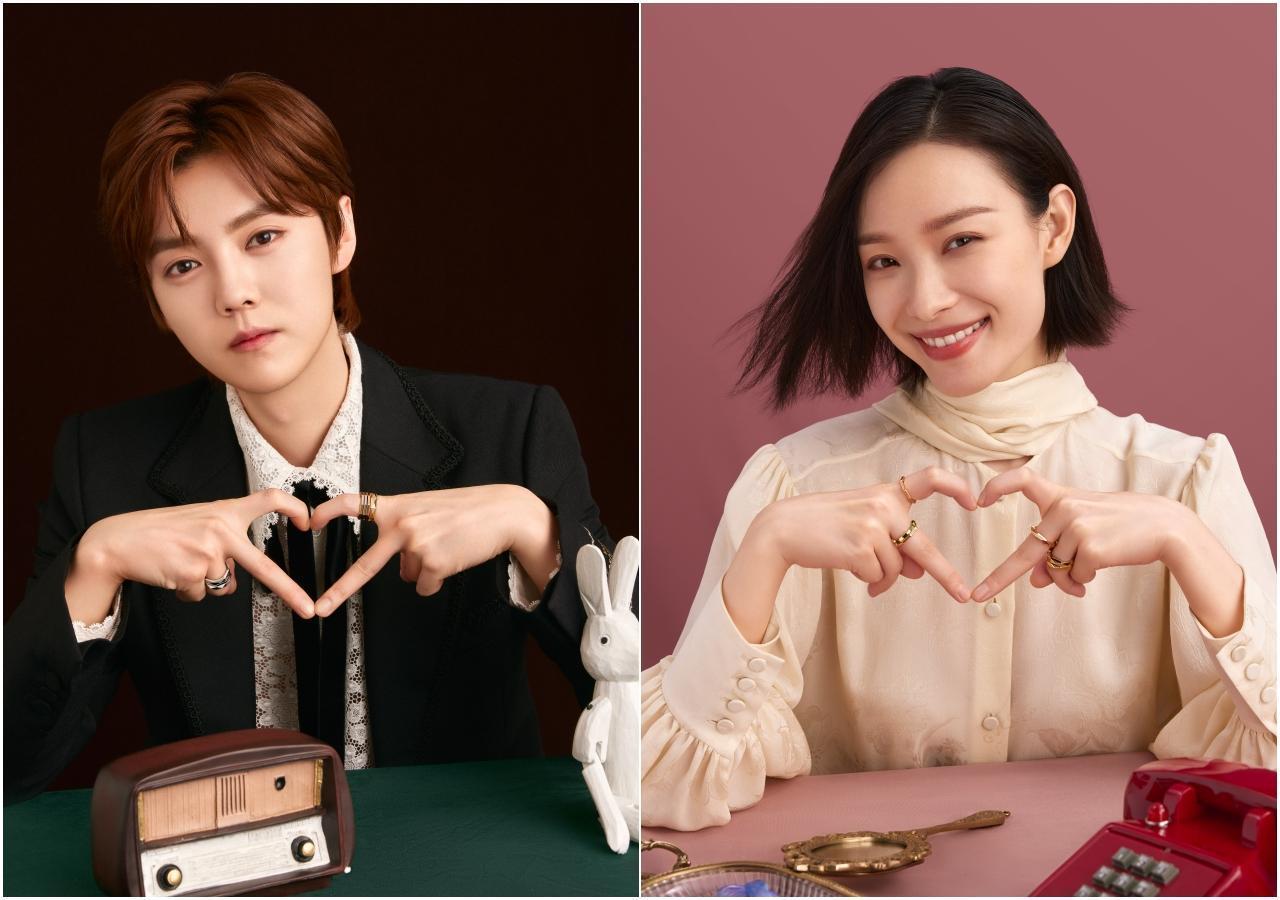 鹿晗(圖左)、倪妮手比愛心,傳達GUCCI Link to Love當代中性珠寶系列訴求的以人生、浪漫、相知相守無限輪回概念。(GUCCI提供)