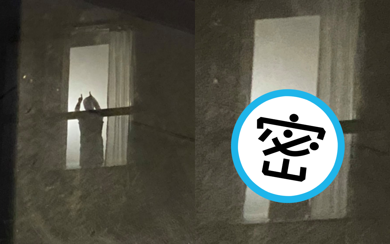 一名確診者在窗邊揮手引起醫護注意。(翻攝自台北慈濟醫院臉書)