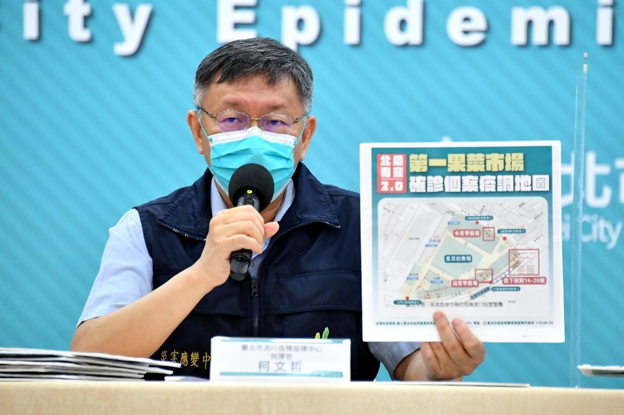 台北市長柯文哲表示,將借助王必勝在部桃與苗栗的經驗,協助北農進行大規模PCR檢測。(台北市政府提供)