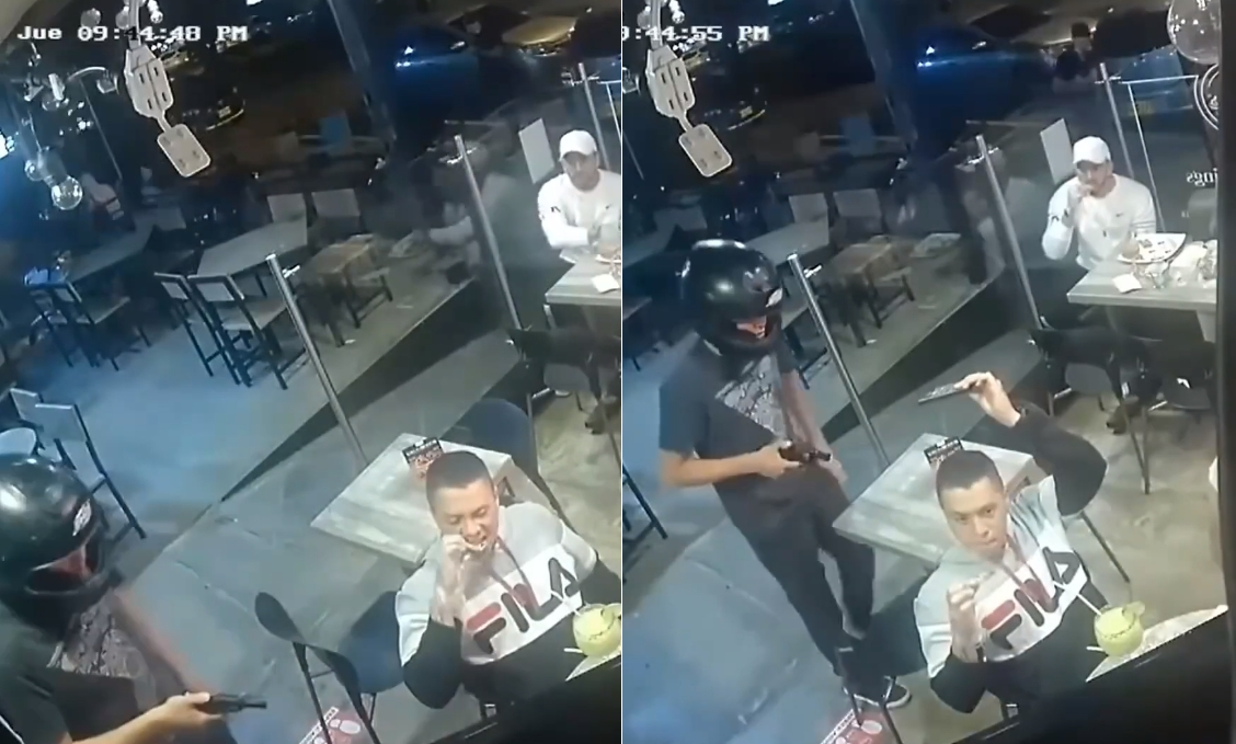 一家餐廳到搶匪持槍闖入，男顧客竟全程淡定啃雞翅。（翻攝自YouTube）