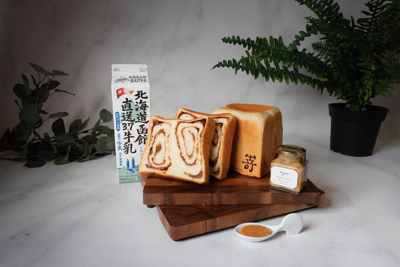 「極花生榛果生吐司」新上市，吃得到花生的細緻顆粒，香氣濃郁。（340元／日規1斤、140元／片）（嵜本SAKImoto Bakery提供）