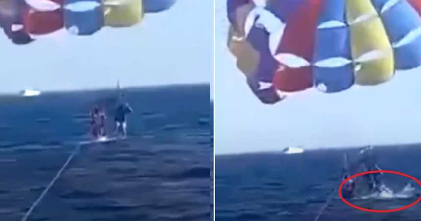一名男子上週五在紅海阿喀巴港(Aqaba)處玩滑翔傘慘被鯊魚咬斷腿。(翻攝自youtube)