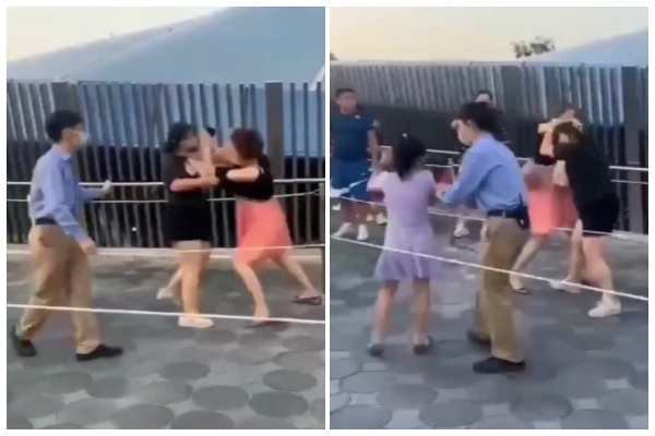 2名女子疑因插隊問題起爭執，直接在孩子面前大打出手，讓孩子（紫色衣服者）嚇得大哭，只能不斷哀求「媽媽別打了！」（翻攝自微博）