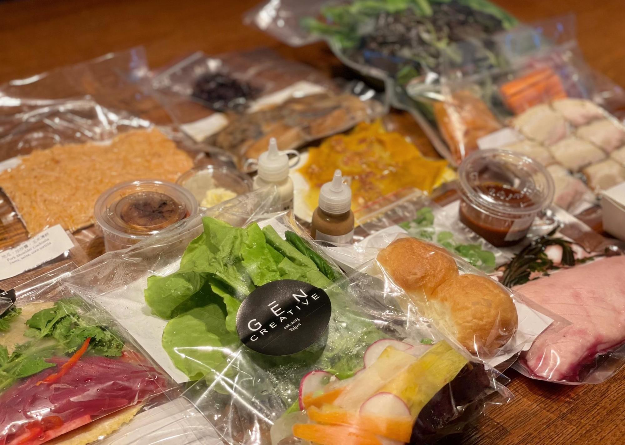 包裝整齊的餐點、食材，經過主廚調味及烹調過。（Gēn Creative提供）