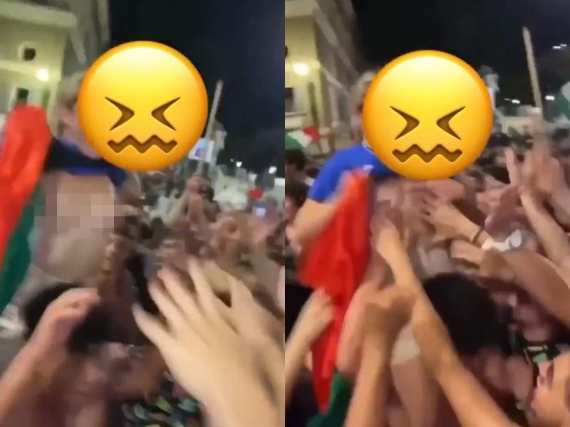 為慶祝義大利擊敗對手，女球迷興奮地掀開上衣，卻遭周圍男球迷襲胸。（翻攝自stanzaselvaggia推特）