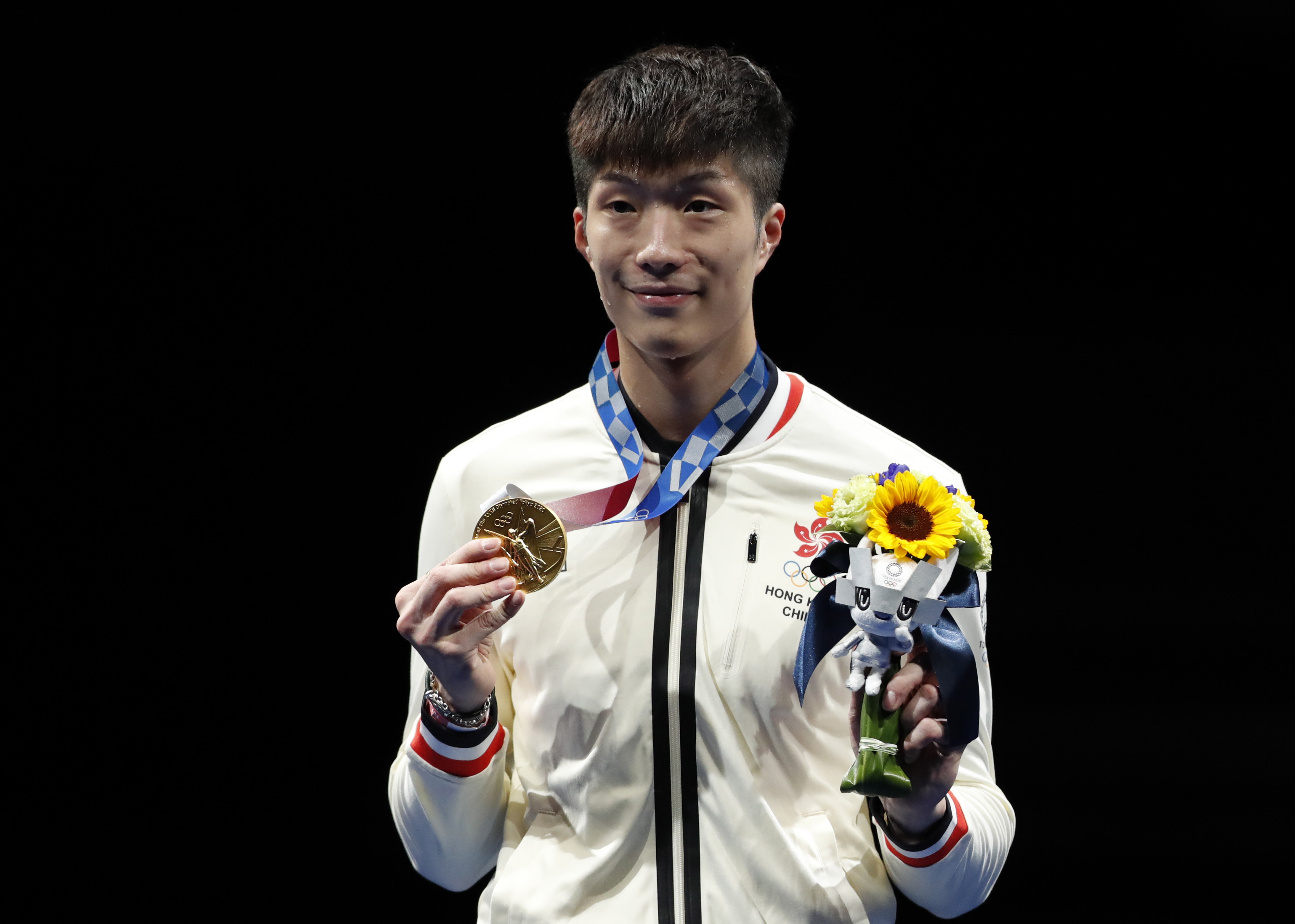 年僅24歲的香港選手張家朗在東京奧運會上拿下擊劍冠軍。（東方IC）