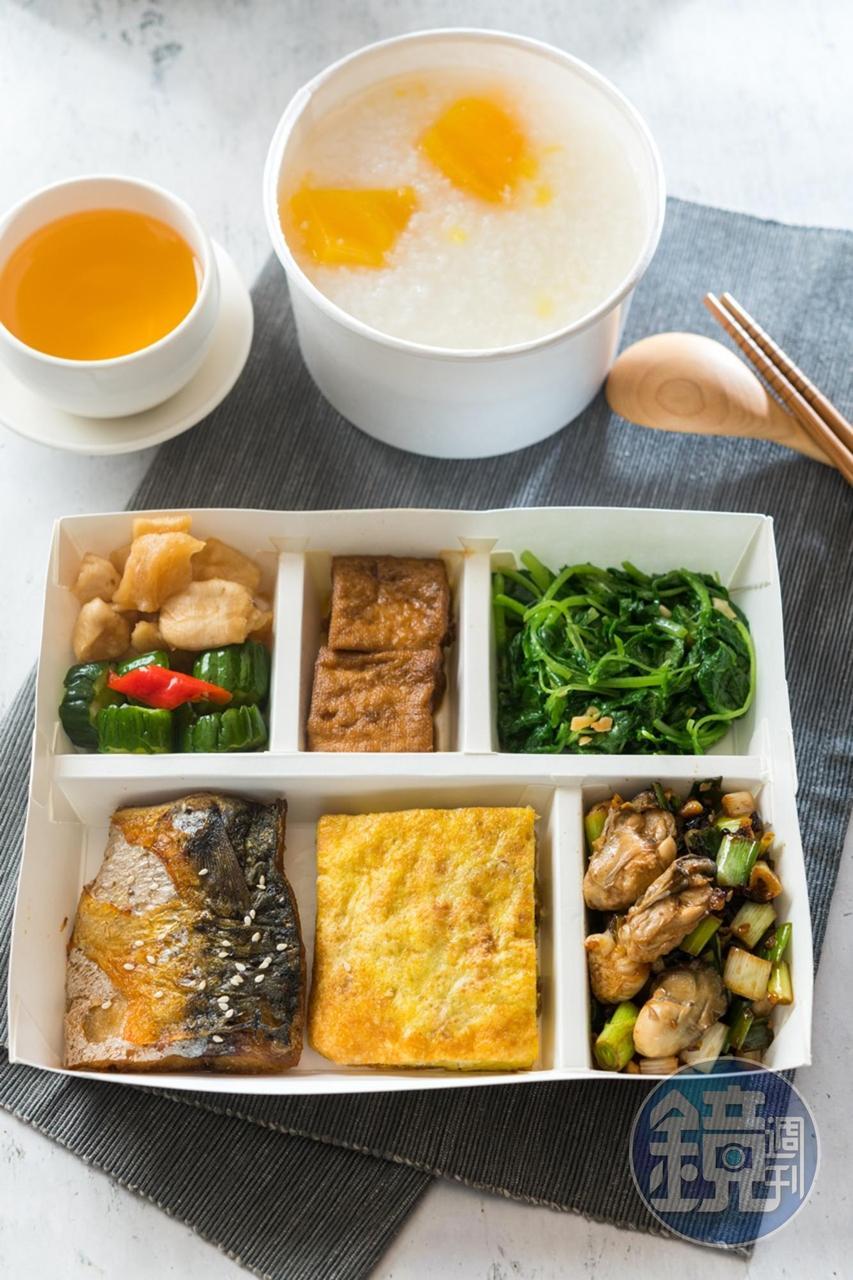 「地瓜粥餐盒」菜色豐富，有鹹鮮的鯖魚片、蔭豉蚵，以及煎得噴香的菜脯蛋、滷豆腐，與粥一起吃，特別開胃。（160元／份） 