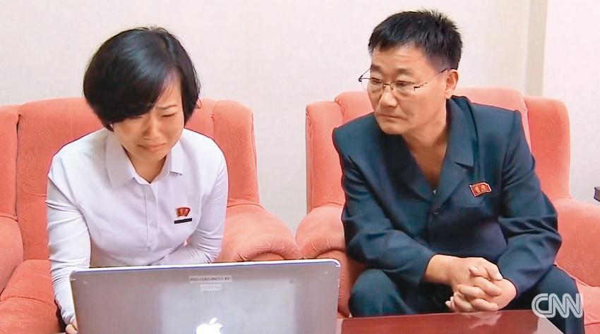 金蓮希的女兒(左)與丈夫接受《CNN》專訪,透過影片得知她的近況,女兒因想念痛哭失聲。(翻攝自《CNN》)