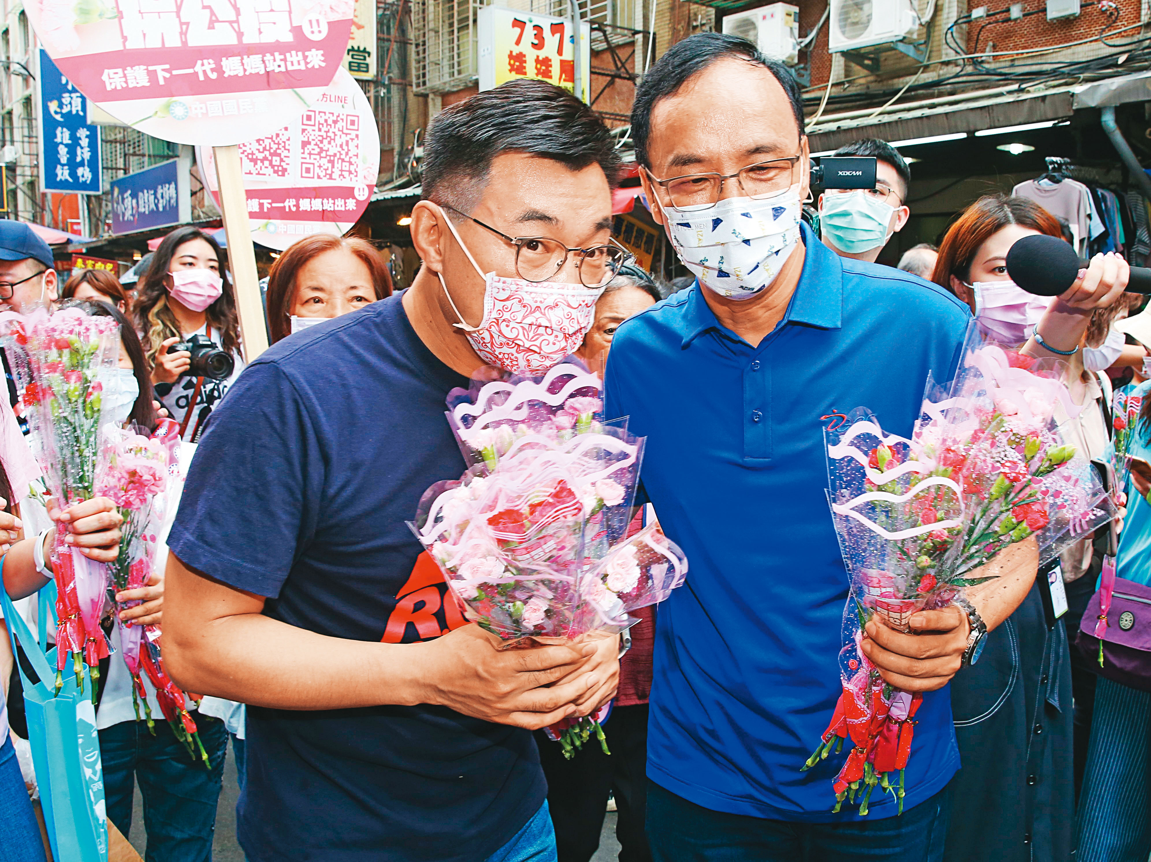 中國國民黨表面上是在選主席，實際上，他們是在取得去中國大陸的入場券。左為江啟臣，右為朱立倫。