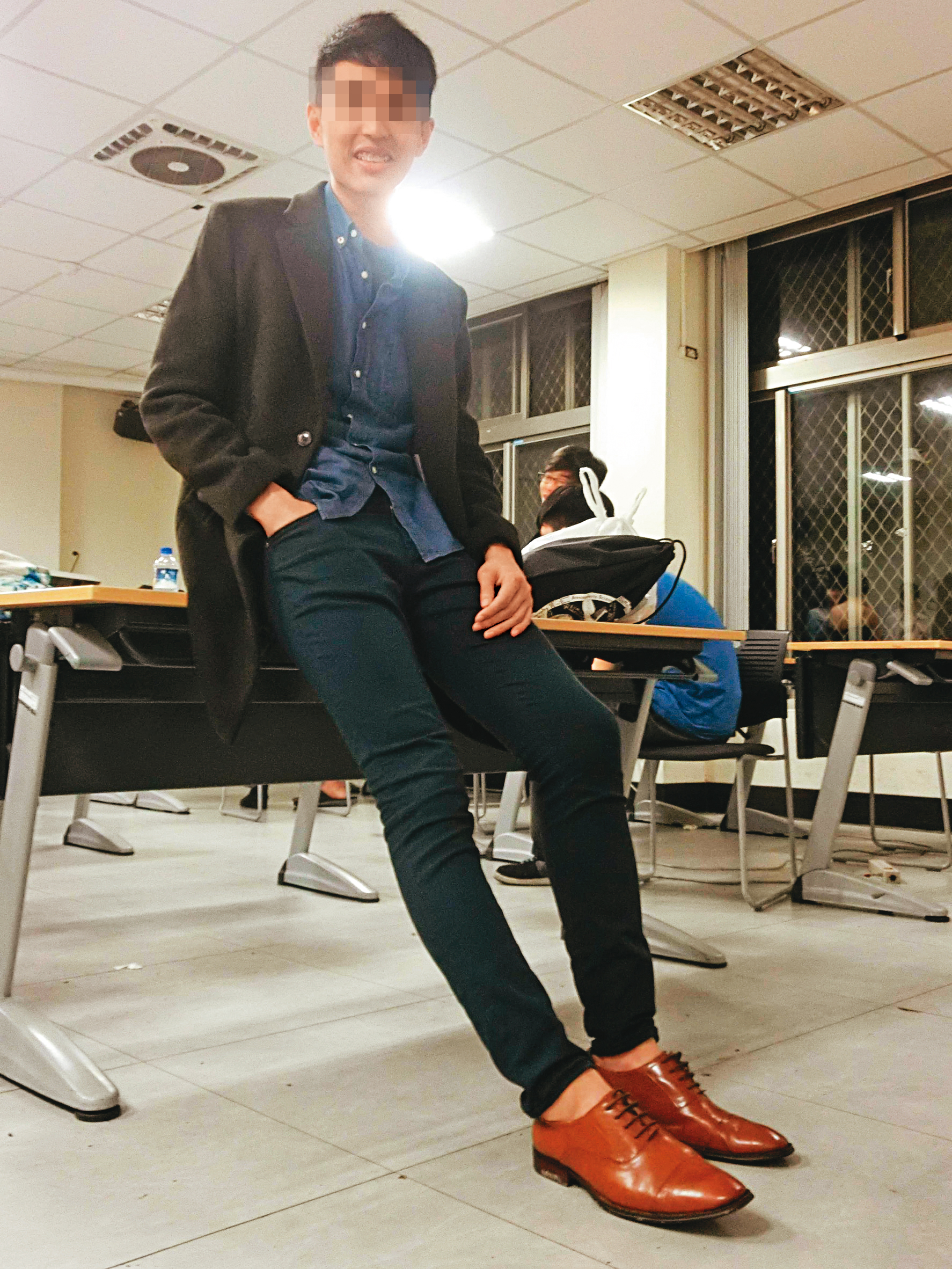 班姓男子穿著打扮走雅痞風。（讀者提供）