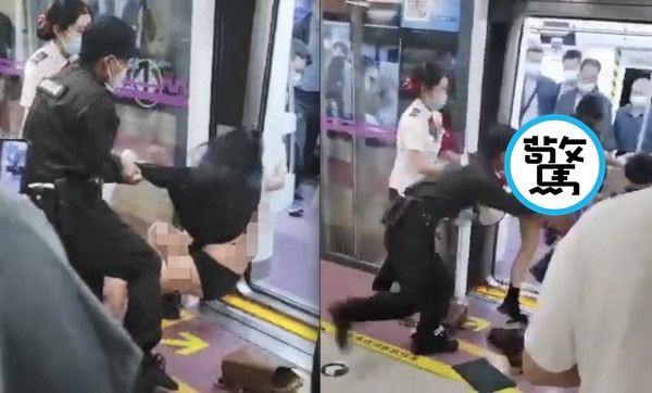 一名女子慘被地鐵保全扯光衣物。（翻攝自畫面）