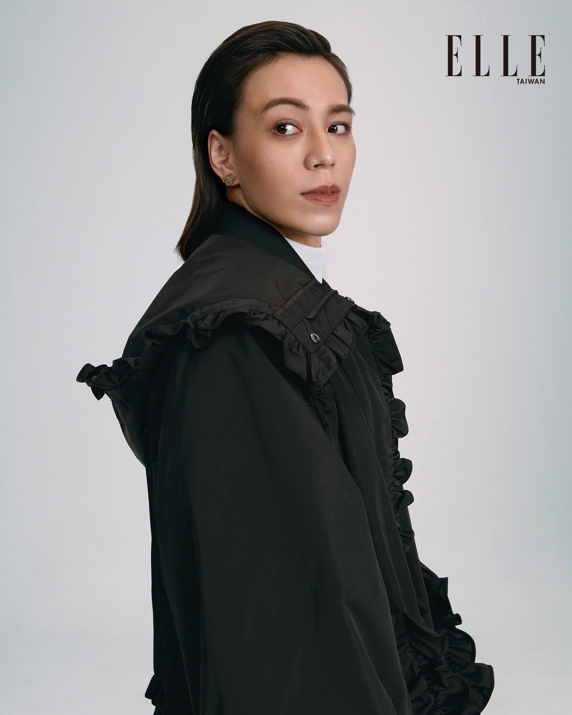 郭婞淳曾羨慕其它女孩能盡情打扮自己，但自己的28年華只剩無盡的體能練習。（《ELLE》國際中文版雜誌提供）