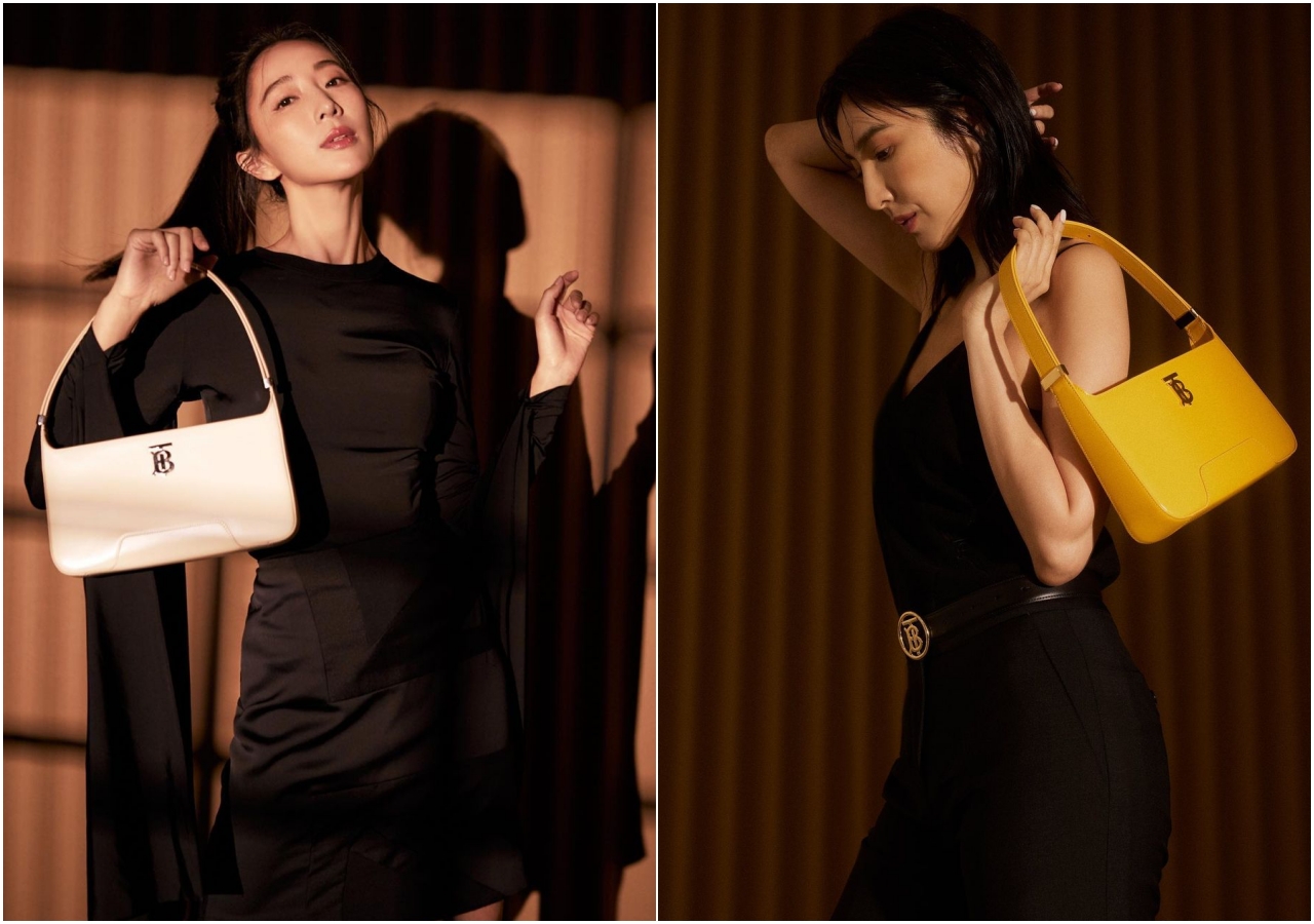 隋棠（左起）、楊謹華分別示範BURBERRY全新皮革TB肩背包，無論是淡香草色或是深番紅花色，皆有不同韻味。（BURBERRY提供）