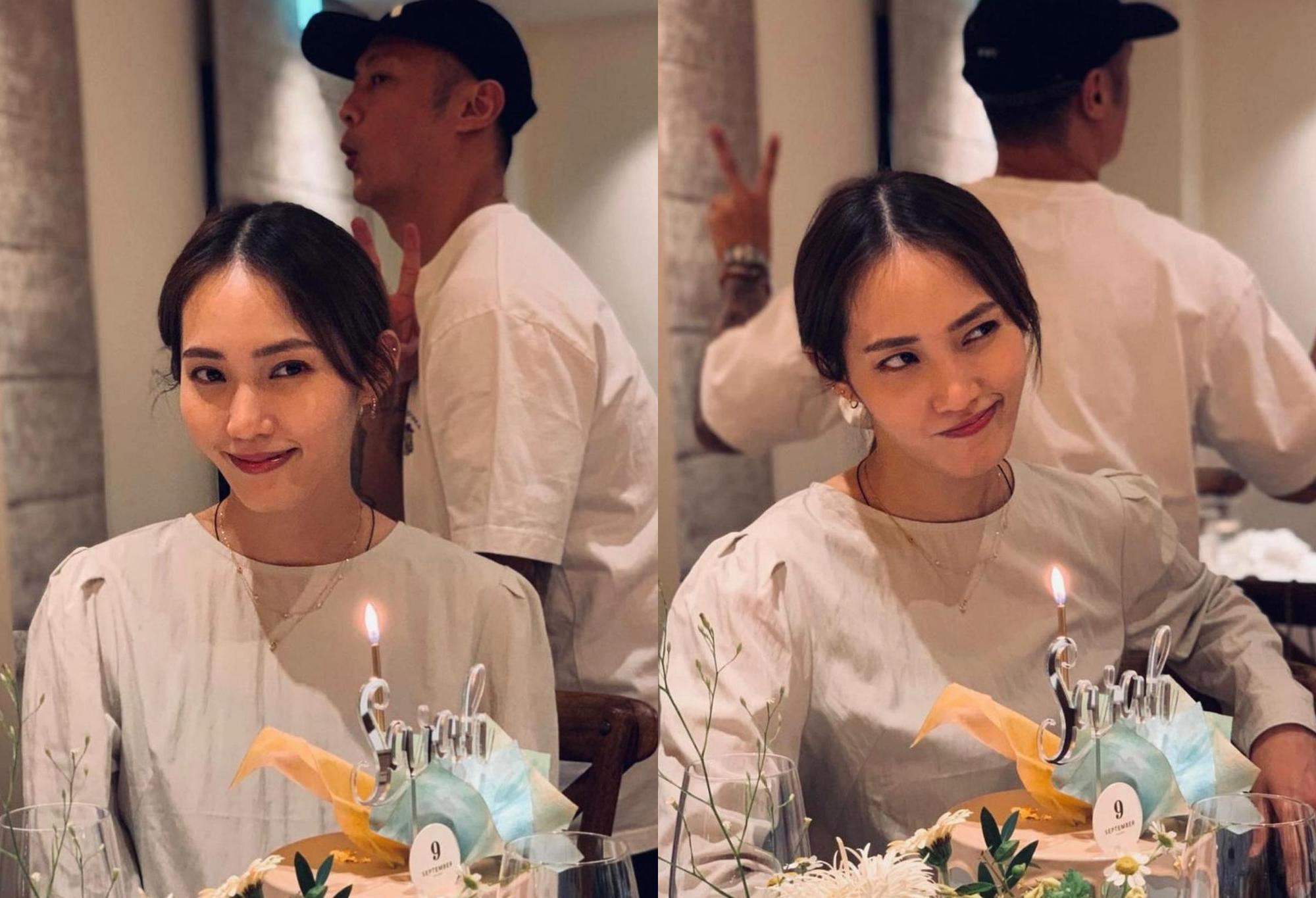 余文樂愛妻王棠云生日，她美美地坐在蛋糕前拍美照，余文樂卻偏在身後搞破壞，老婆又好氣又好笑。（翻攝自余文樂IG）