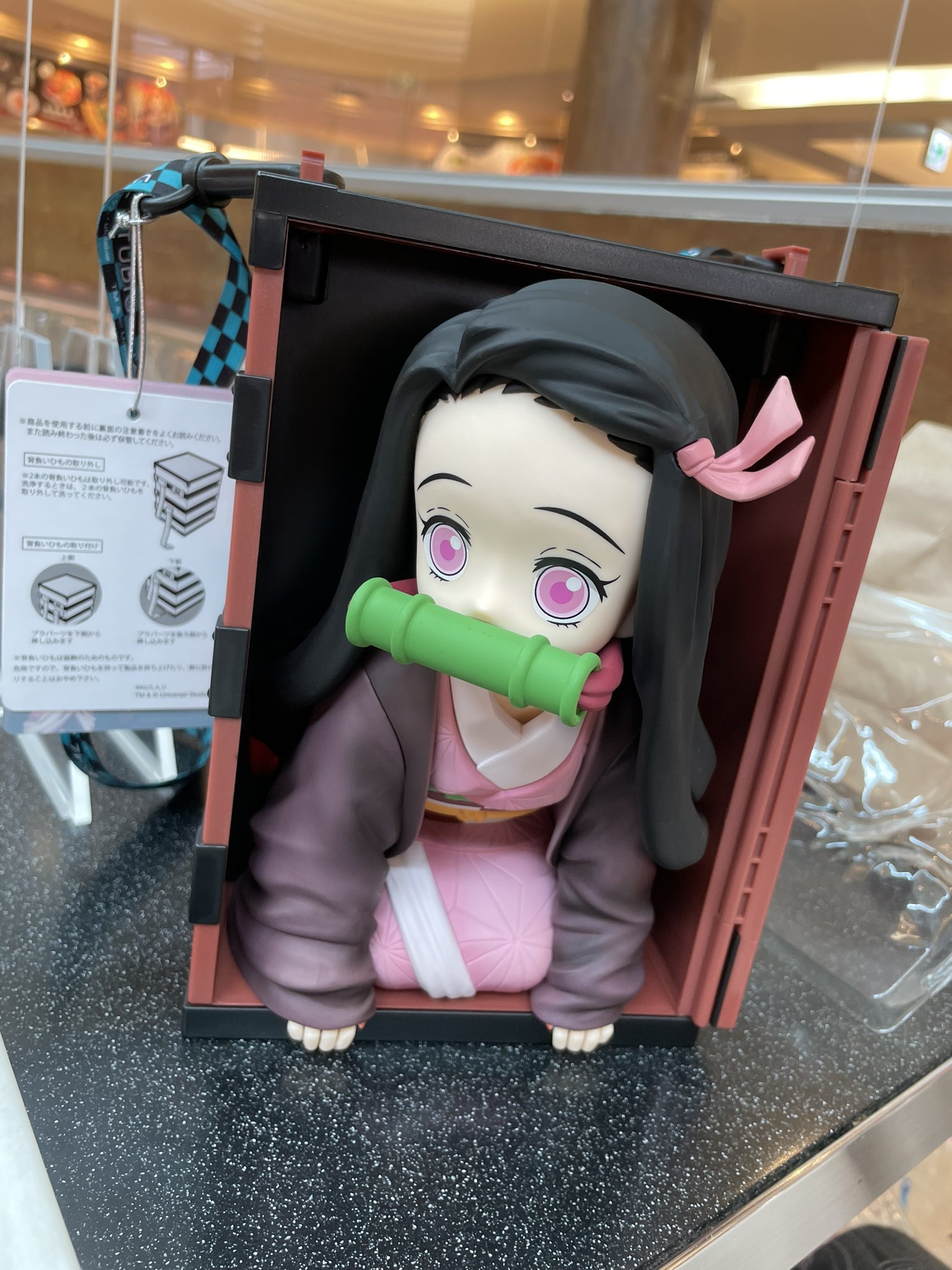 禰豆子爆米花桶重現禰豆子從木箱裡往外探頭的經典畫面。（翻攝twitter@ruka_asuna3521）