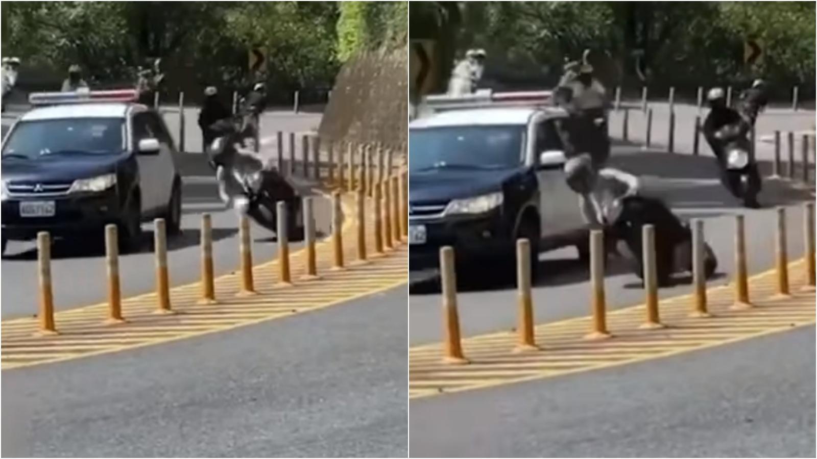 重機騎士無視彎道禁止超車的規定,直接壓車超過警車。(翻攝自臉書社團)