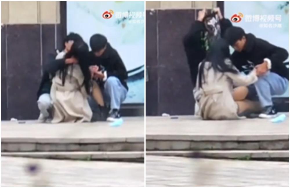 一名正妹和2男蹲在大樓旁的角落親熱。（翻攝微博）