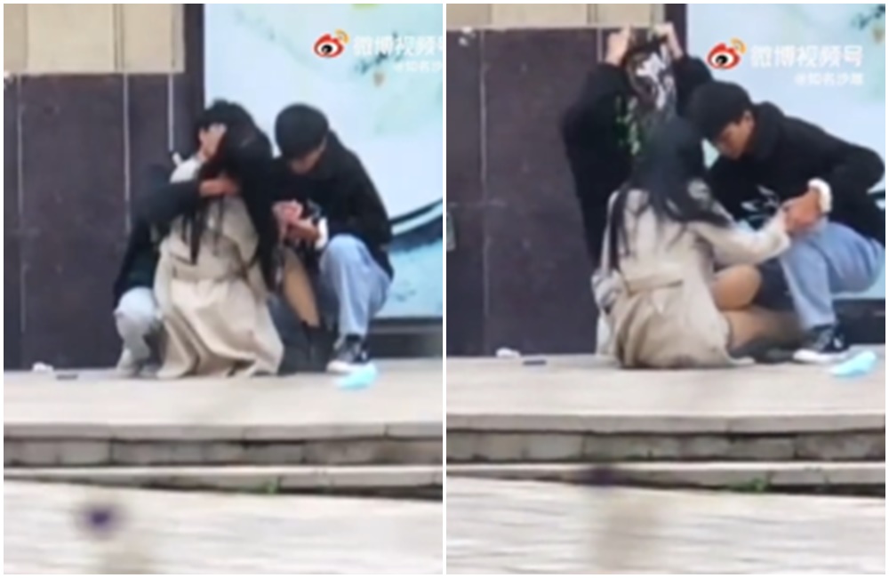 一名正妹和2男蹲在大樓旁的角落親熱。（翻攝微博）