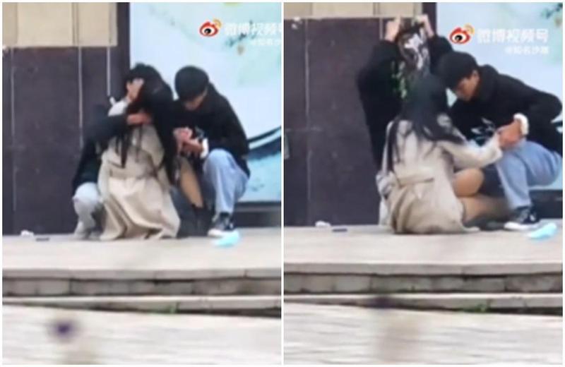 一名正妹和2男蹲在大樓旁的角落親熱。（翻攝微博）