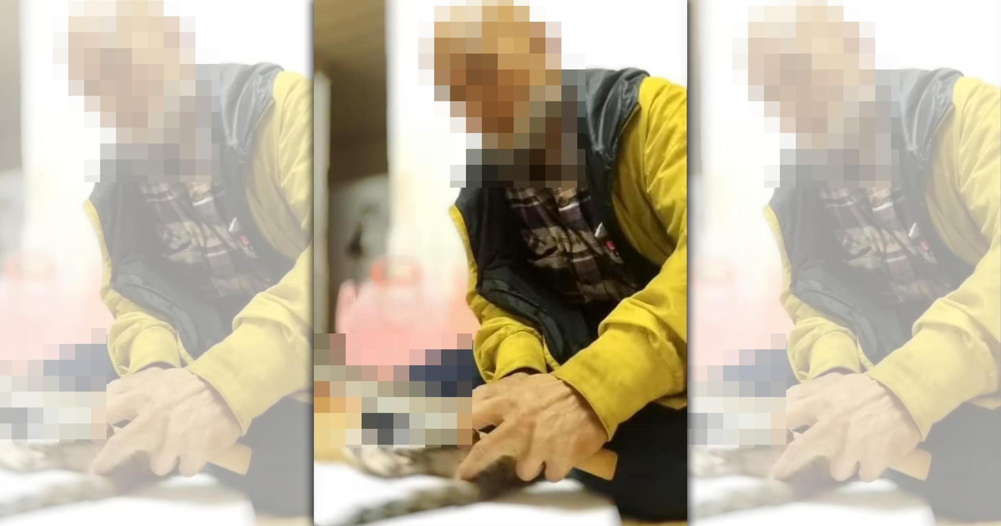 吳姓光頭男剁貓尾影片引發網友撻伐,全案依動保法偵辦。(翻攝自邵柏虎臉書)