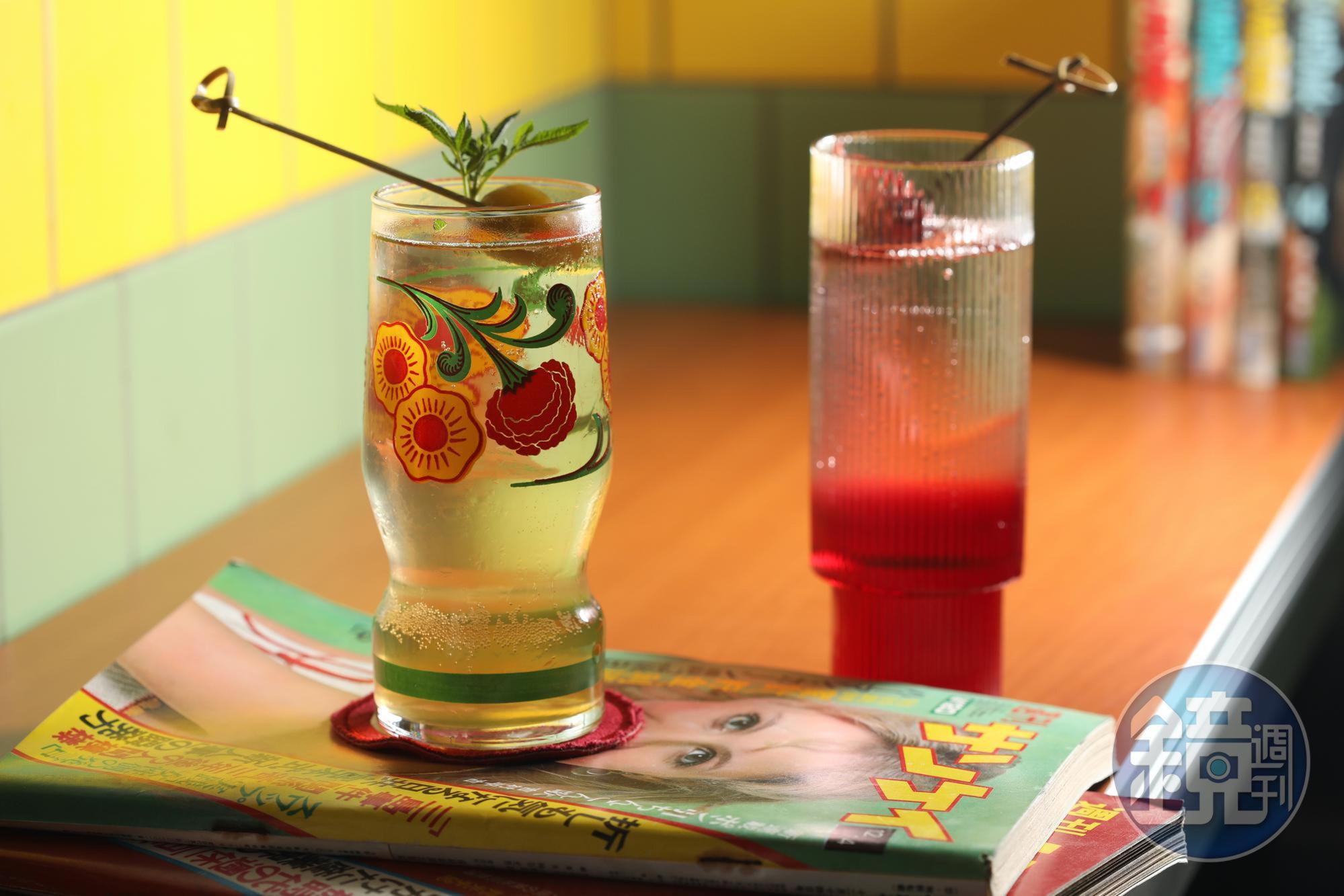 「晶晶百惠」(前)以芳香萬壽菊裝飾,帶出柑橘味道;酒譜中常以柑橘系提出酸度,「赤色懸疑」(後)改用桑椹醋拉出酸甜酒感,再融合義大利開胃酒和甜菜根。(皆280元/杯)