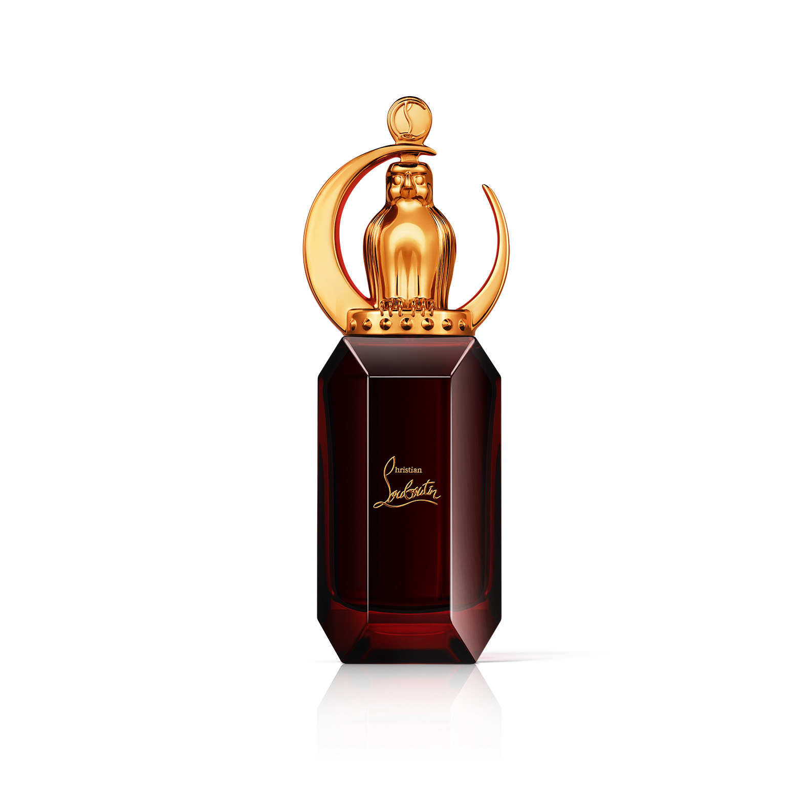 LOUBILUNA木質東方香調,在閃耀的沙漠太陽頭上刻著Christian Louboutin的第一個字母「C」字。NT$11,250/90ml。(Christian Louboutin提供)