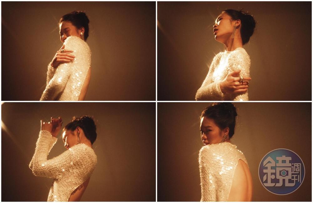 玻璃珠刺繡白色露背洋裝 NT$536,200 by BOTTEGA VENETA；Crystal Logo水晶寶石流蘇耳扣 價格店洽by PRADA；純銀扣環寬版戒指 NT$24,100 by BOTTEGA VENETA。