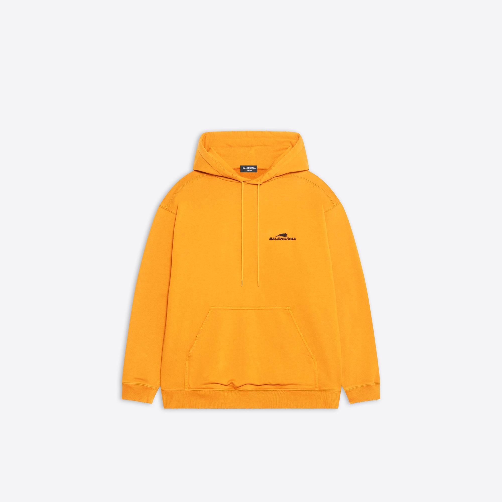 橘色LOGO連帽上衣。NT$27,600(BALENCIAGA提供)